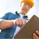 Construction worker with a clipboard