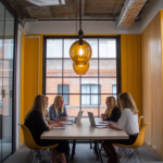 Employees talking around a table