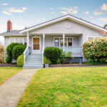 Small American home with light exterior and white trim. — Stock Photo, Image Remove BG Save Share Sample Small American home with light exterior and white trim