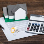 Contract Paper With Keys And Calculator