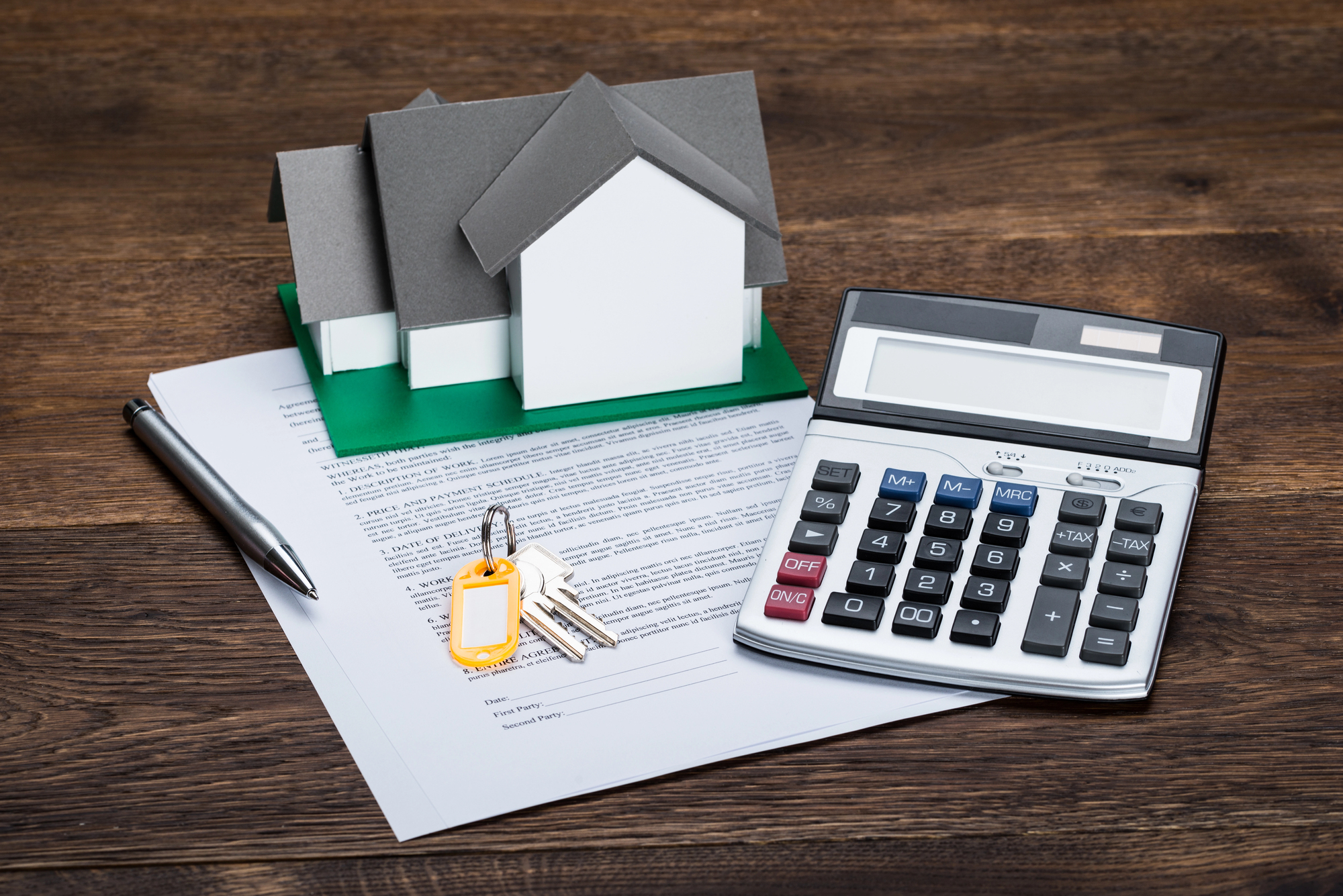 Contract Paper With Keys And Calculator