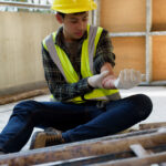 Injury bleeding from work accident in pile of scaffolding