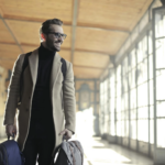 Man carrying travel bags
