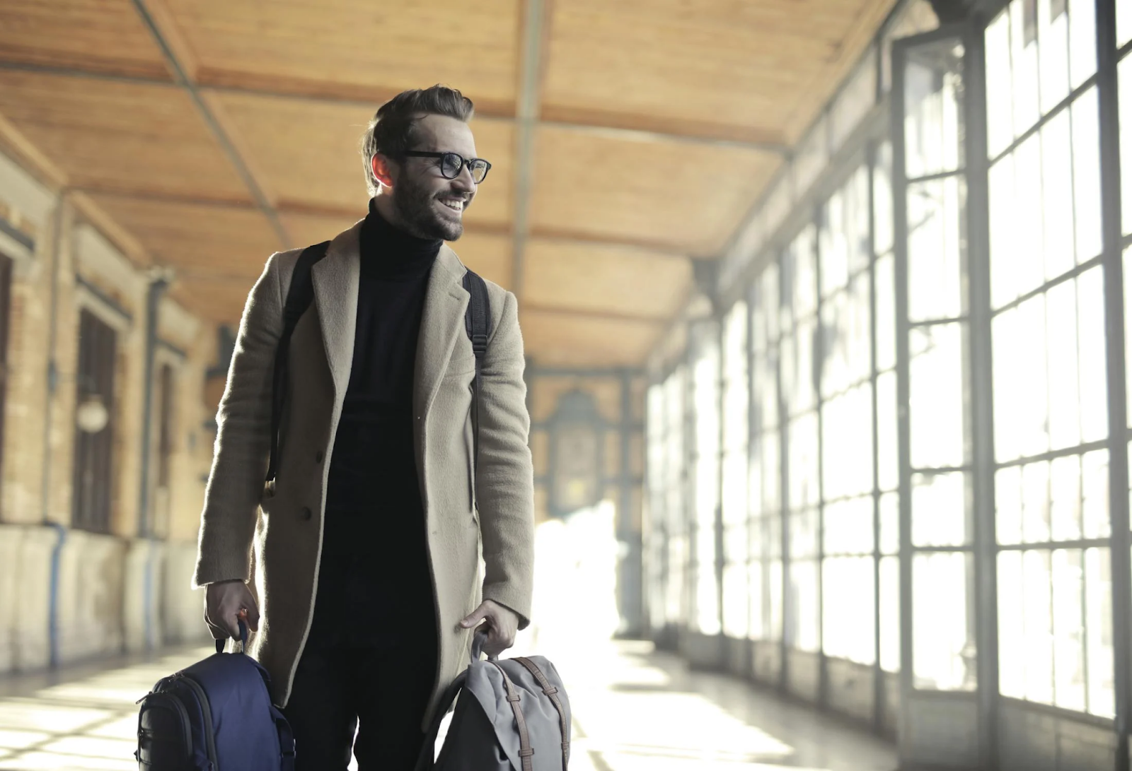 Man carrying travel bags