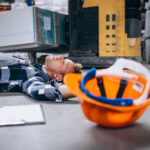 An accident at a warehouse, man on floor