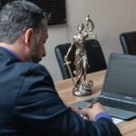 Attorney signing a document