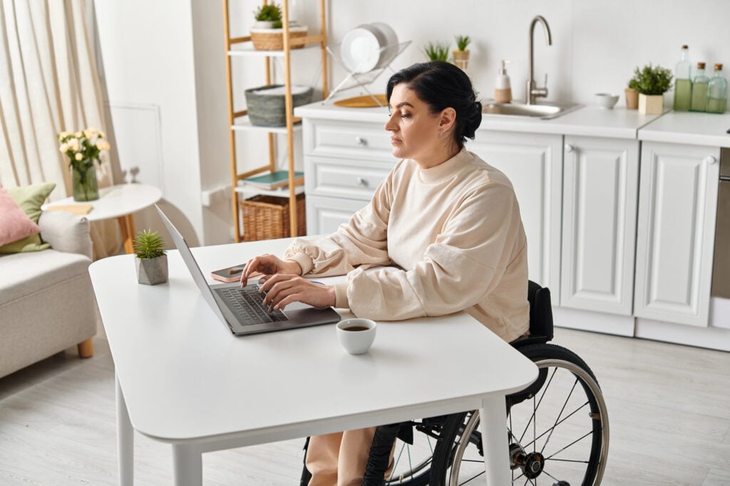 HR & CE Webinars 3 Disabled Woman Wheelchair Works Remotely Her Laptop