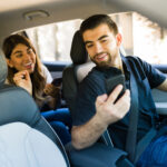 Hispanic driver on a rideshare app