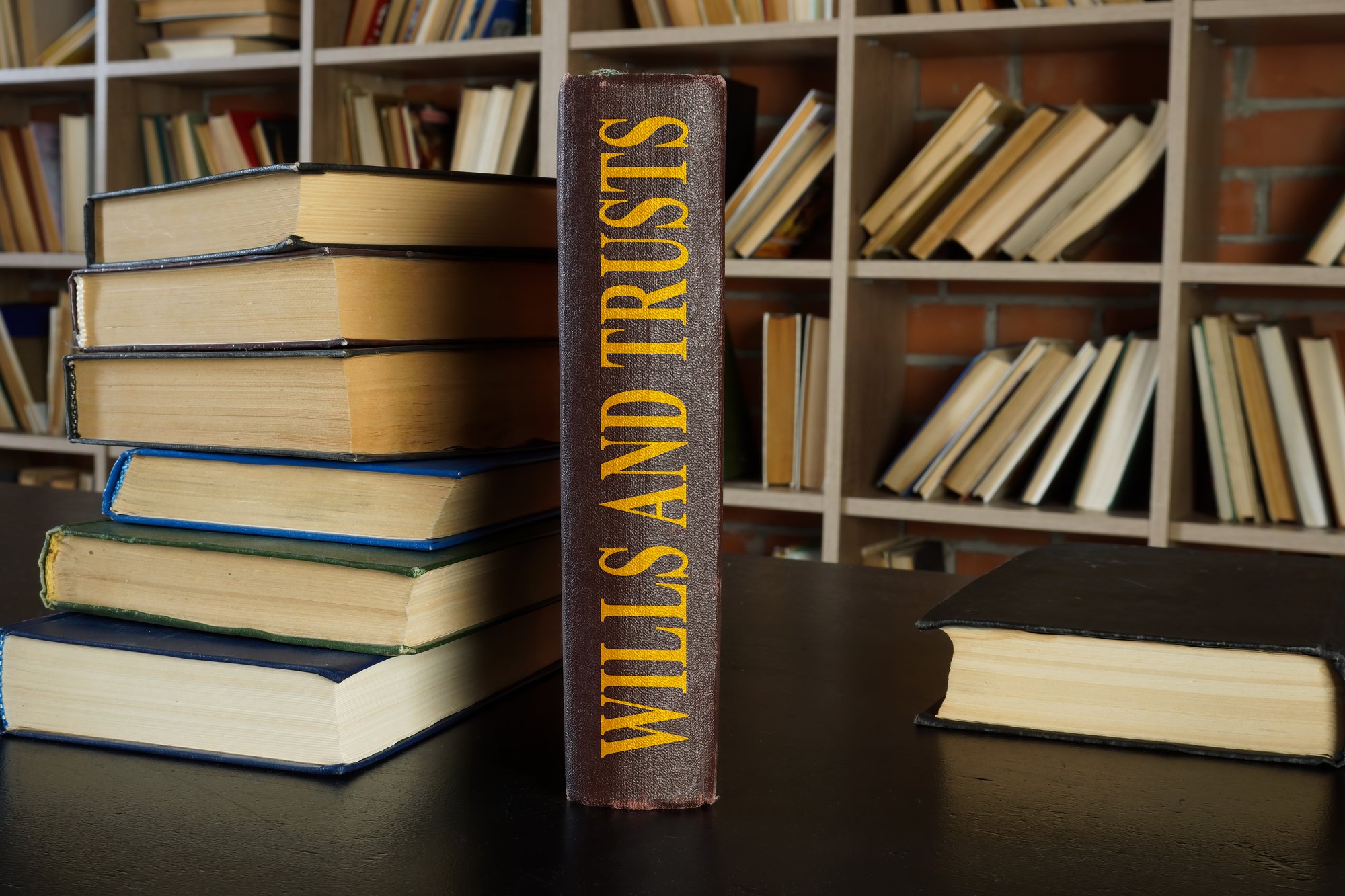 Law book about wills and trusts on the desk