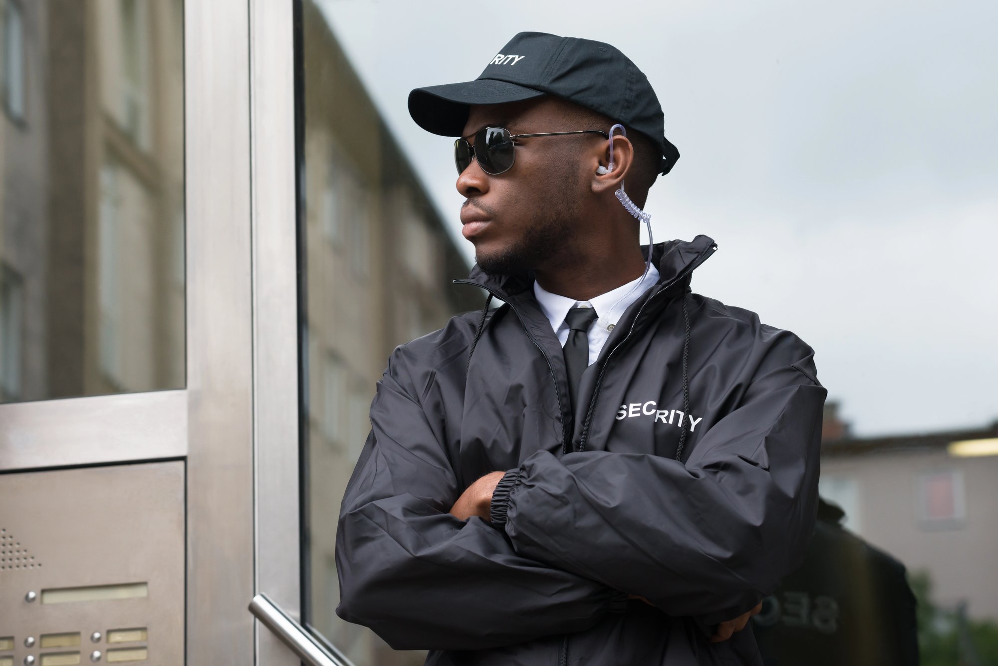 Security Guard Standing Arms