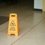 yellow caution wet floor sign