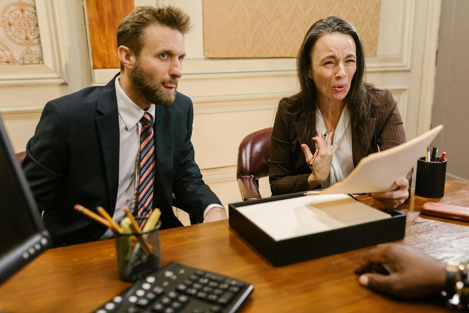 Couple talking with an attorney
