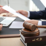 Gavel with juridical books