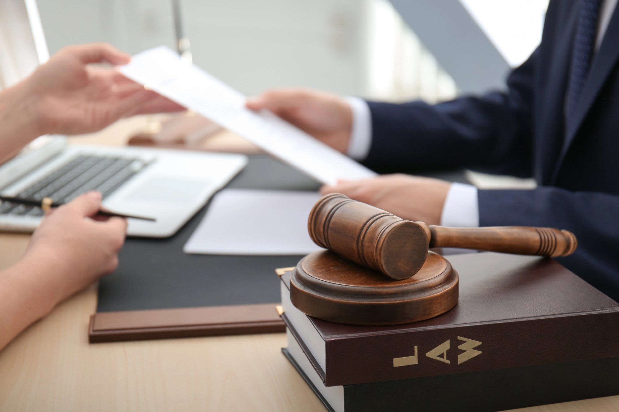 Gavel with juridical books
