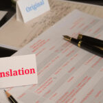 Legal Risks of Poorly Translated HR Documents 5 Translation paperwork on table in office