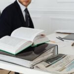 Acquiring Pre-Settlement Funding: A Guide for Lawyers 10 Attorney reading an law book