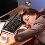 Sleep, Safety, & the Law: Why Rest Policies Matter at Work 8 Businesswoman asleep