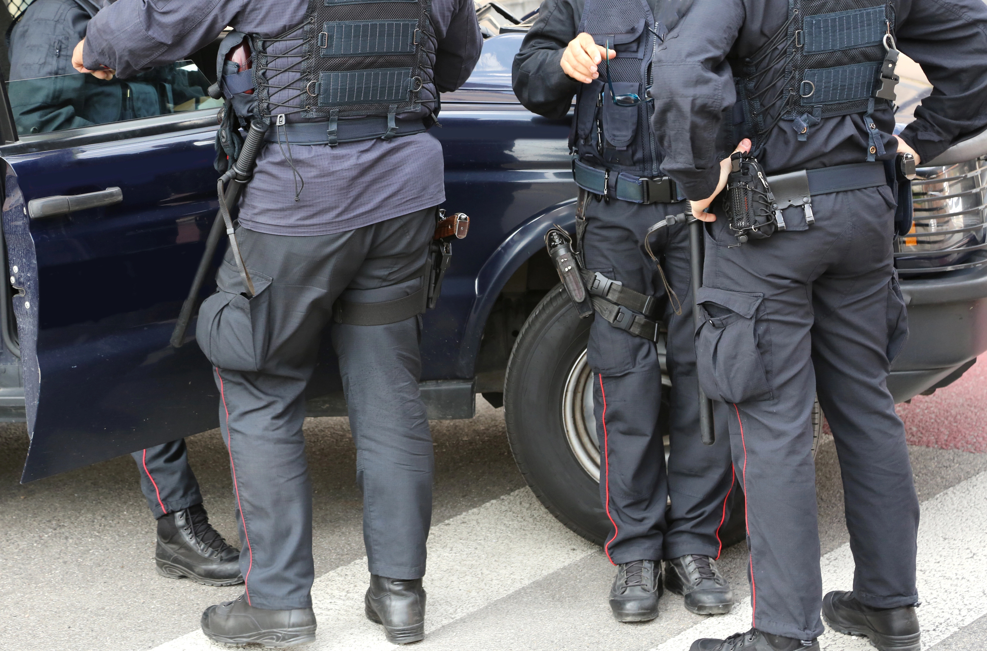 Policeman in riot gear during a roadblock