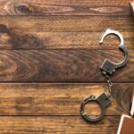 Handcuffs on wood table