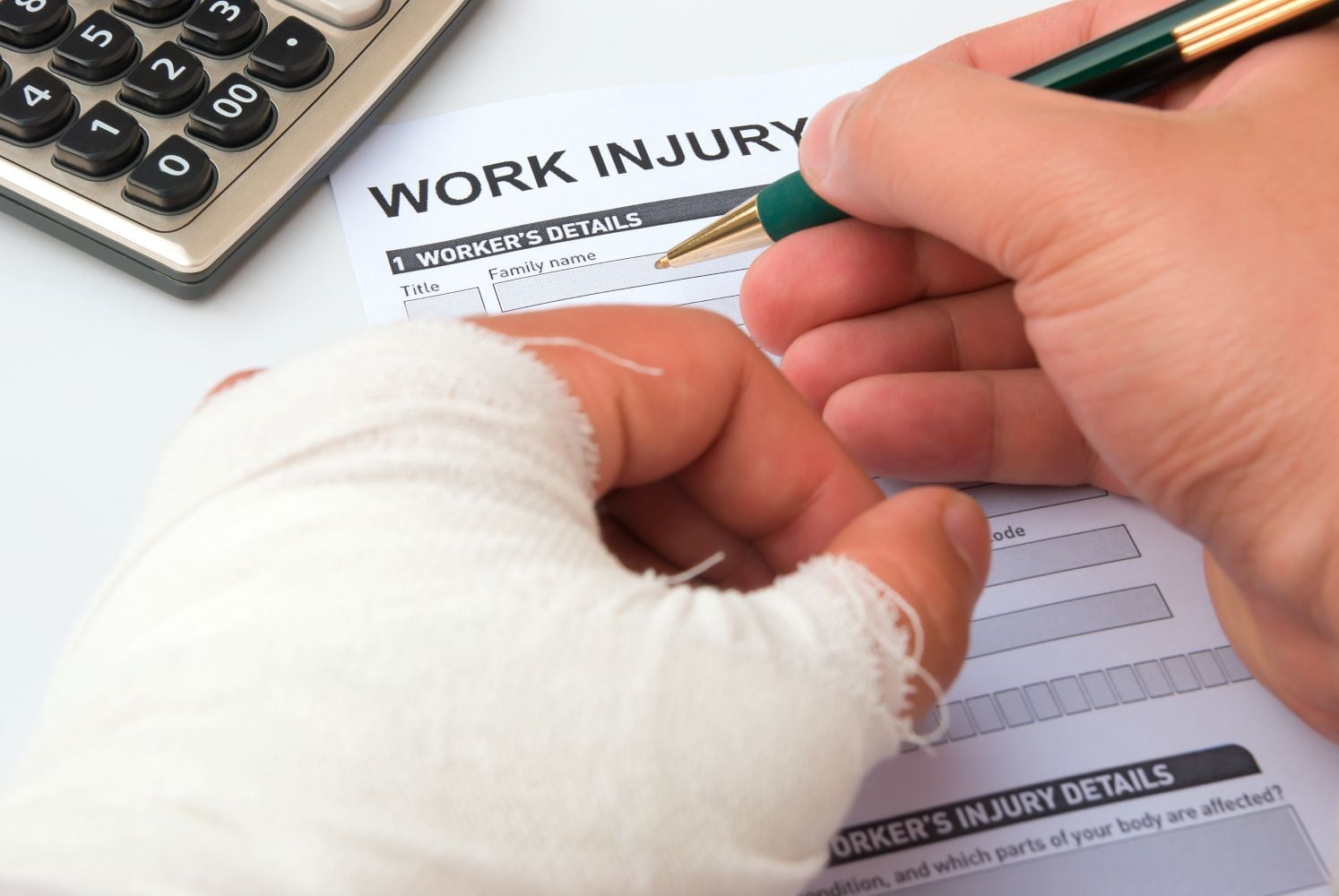 Injured man filling out work injury form Injured man filling out work injury form