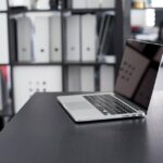 Laptop on black table