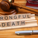 Table with wrongful death written and gavel