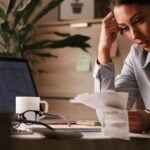 Woman looking at reciepts