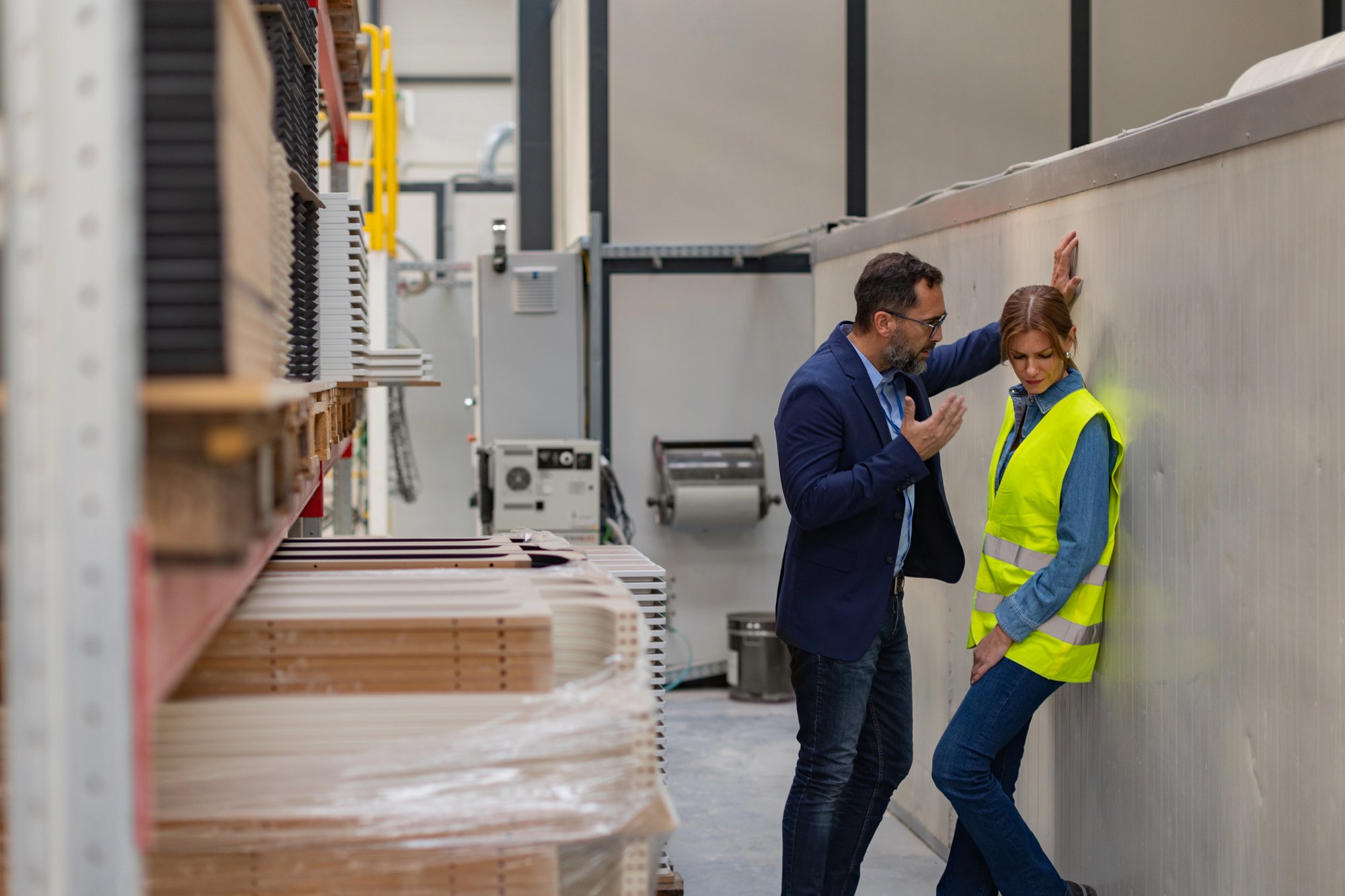 Female worker in manufacturing feeling vulnerable