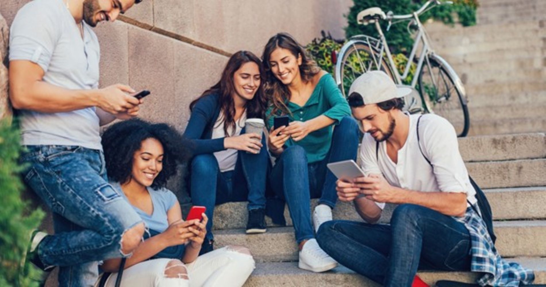 Young people hanging out on some stairs
