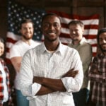 What Steps Should You Take to Extend or Change Your Immigration Status? 7 American Team Of Patriotic Standing In Office