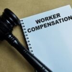 Gavel next to workers compensation