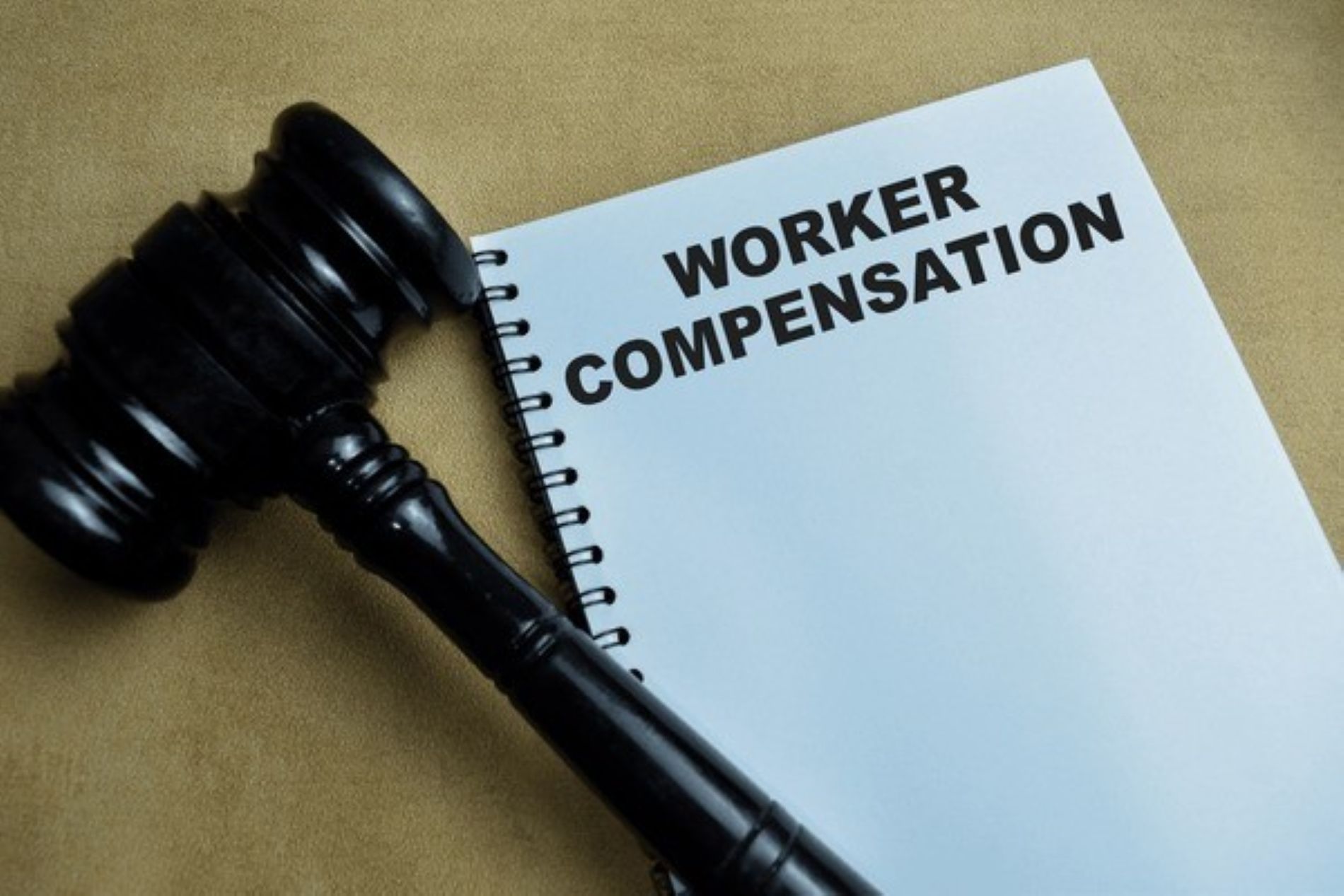 Gavel next to workers compensation