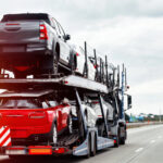 Hydraulic trailer with cars loaded