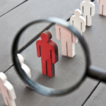 Magnifying glass focused on a wood character