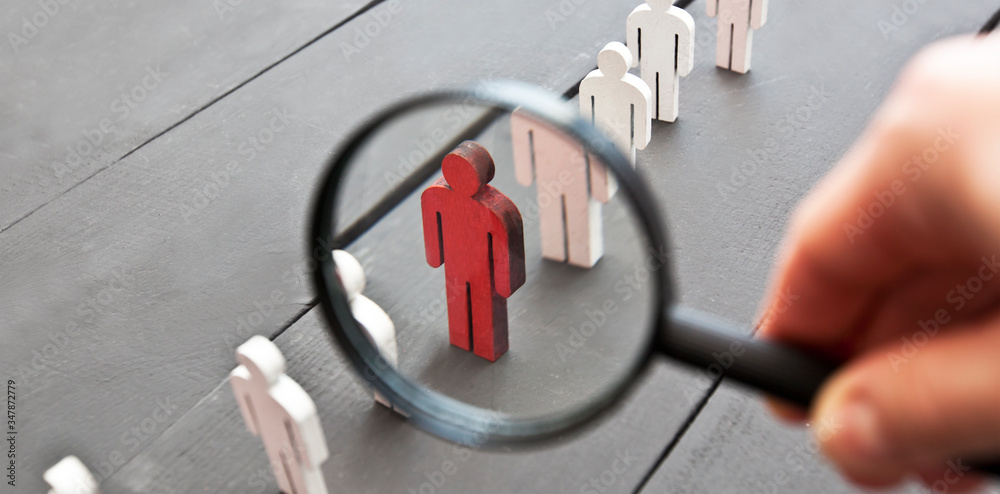 Magnifying glass focused on a wood character