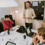 Office Team Sitting at the Table