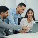 Friendly creative diverse colleagues team discuss online project