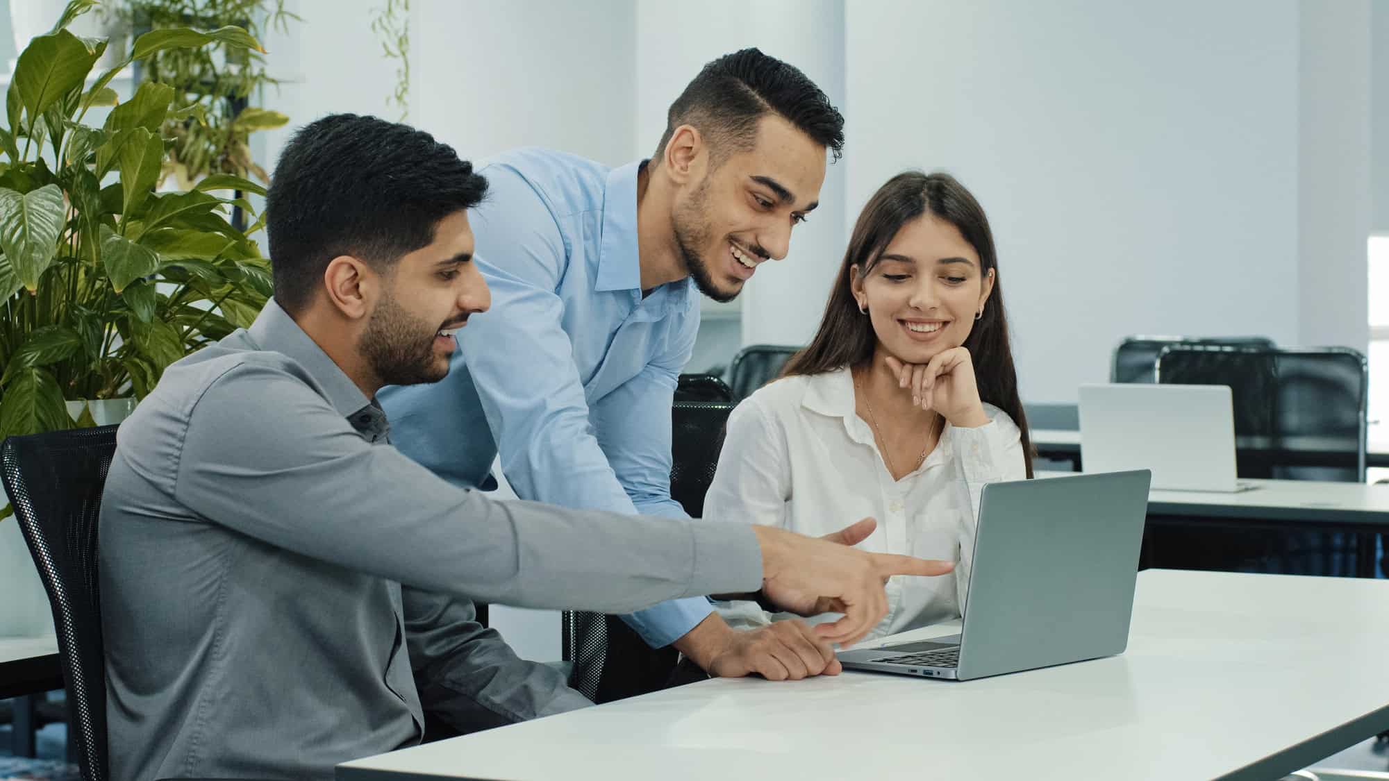 Friendly creative diverse colleagues team discuss online project