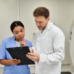 Two doctors collaborate on patient diagnostics