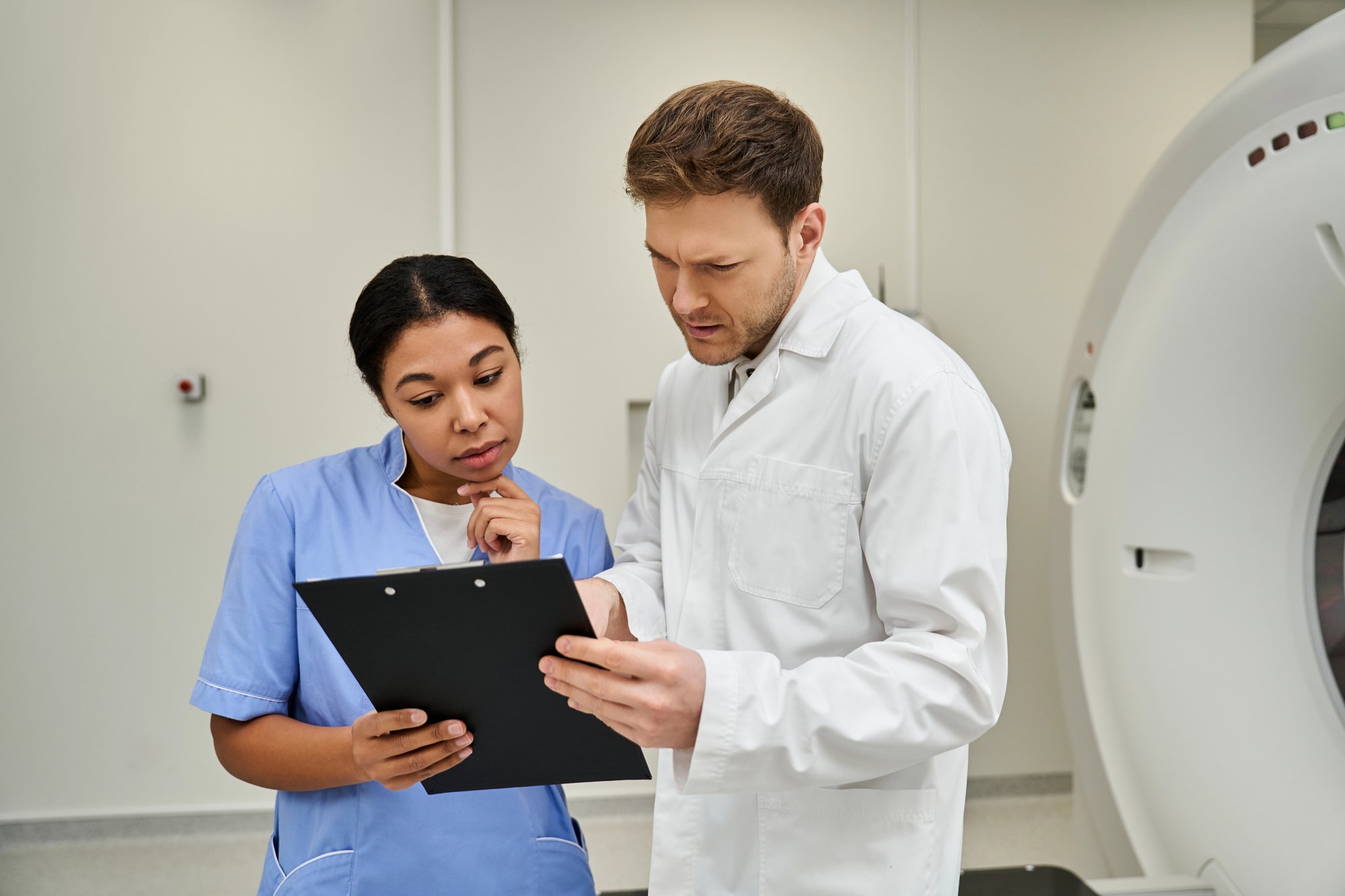 Two doctors collaborate on patient diagnostics