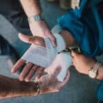 man being treated for a wrist injury