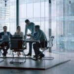 Employees discussing in a conference room