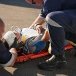 Paramedic, emergency and injury check on road