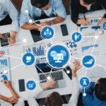 A diverse team engages in business analytics