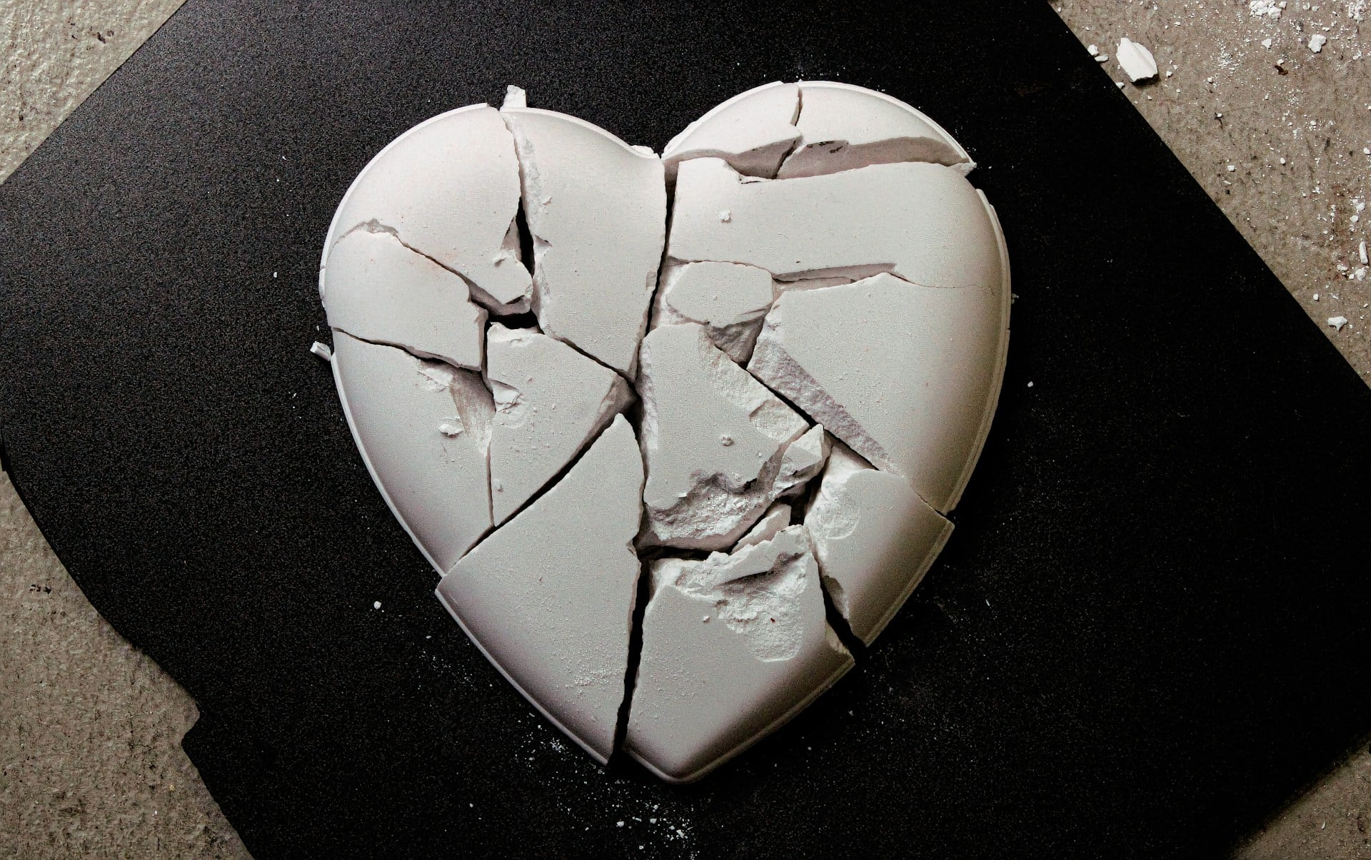 A broken heart made of white gypsum