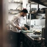 7 Everyday Incidents That Can Spark Unexpected Liability Claims 6 man in white dress shirt holding white ceramic plate