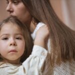 The 10 Best Sacramento Child Custody Attorneys You Should Know in 2026 9 Tender moment between a mother and child embracing indoors, capturing love and connection