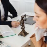 Legal Issues When Remote Workers Are Injured at Home 7 Woman talking to an attorney