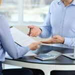 How Employers Can Document Workplace Accommodation Decisions 7 Employees having a discussion