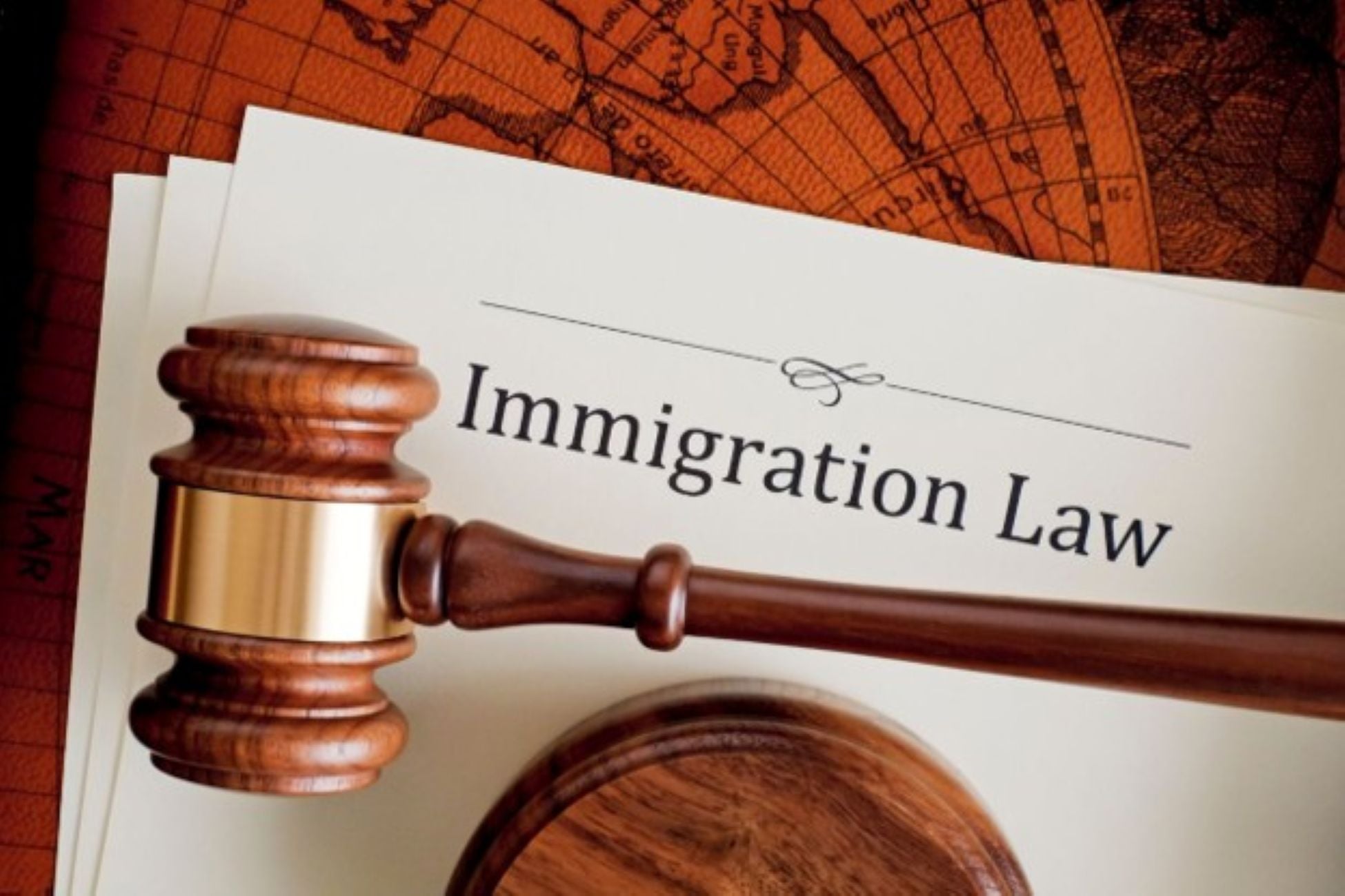 Gavel with Immigration Law written in the background